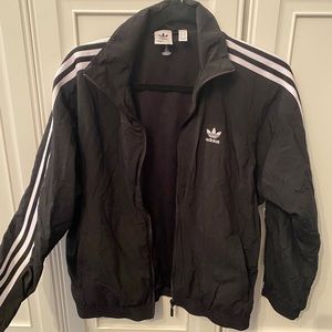Brand New Adidas Track Jacket Black with white stripes and pockets. Size UK 8